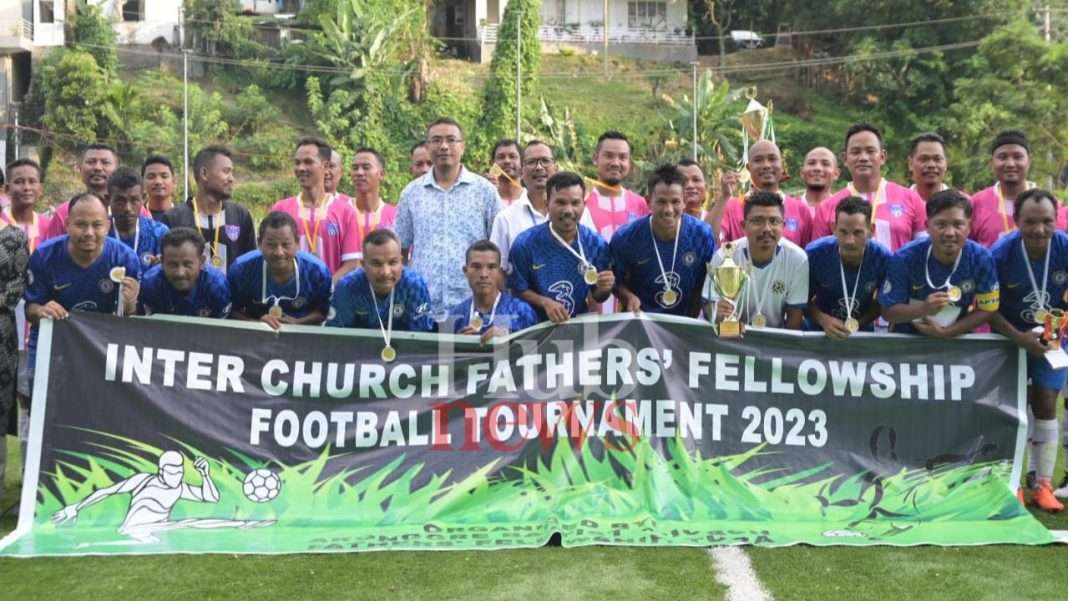 Nikseng Gittim lift championship trophy of Inter Church Father's Fellowship Football Tournament 2023