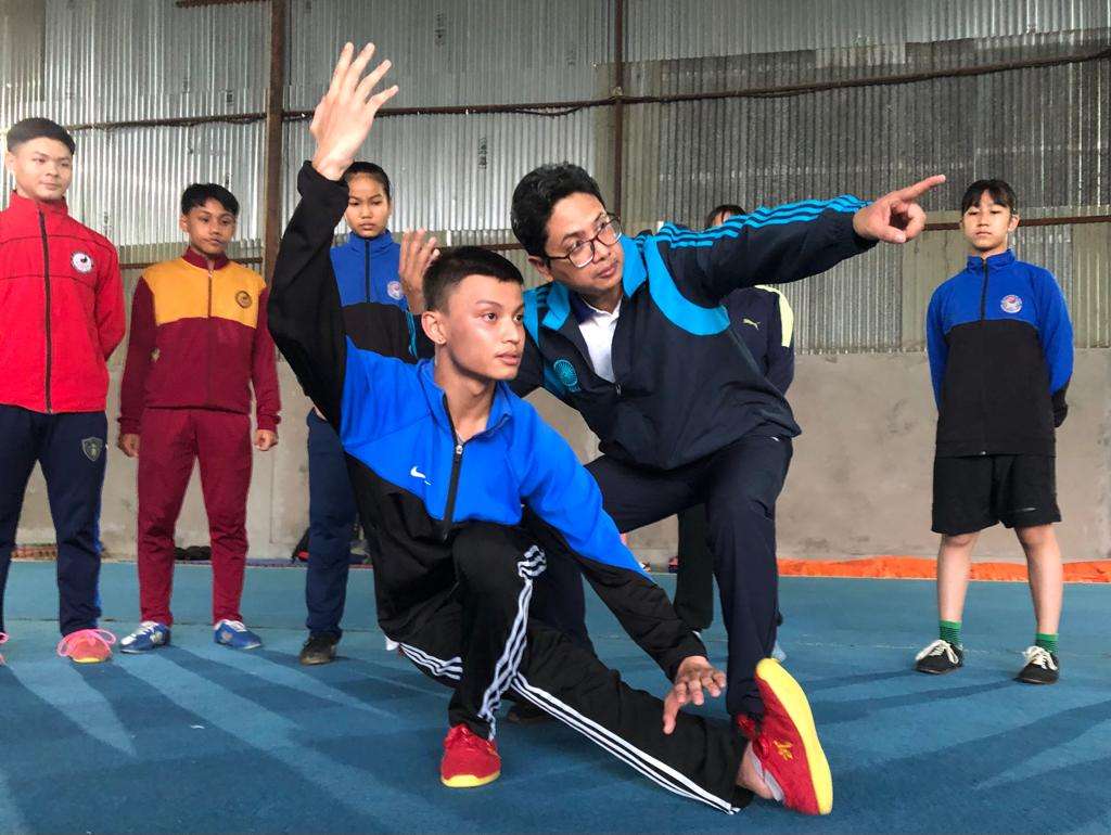 Balancing profession with passion: Manipuri neurosurgeon Dr Amitkumar nurtures future Wushu champions 