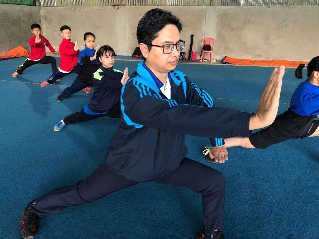 Balancing profession with passion: Manipuri neurosurgeon Dr Amitkumar nurtures future Wushu champions