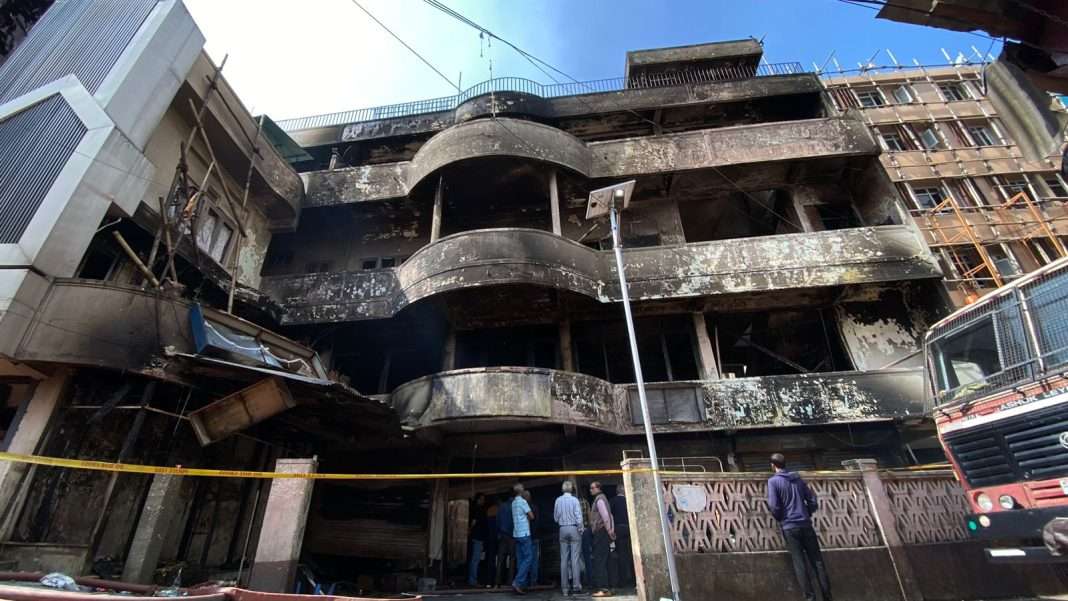 In Pics: 4 Storey building reduced to ashes in devastating fire in Police Bazar