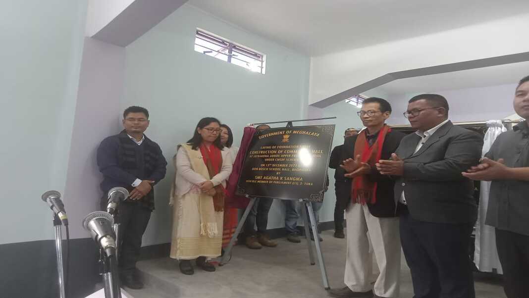 Agatha lays foundation for Boulder Sausage wall along Simsang river, Community Hall in Baghmara