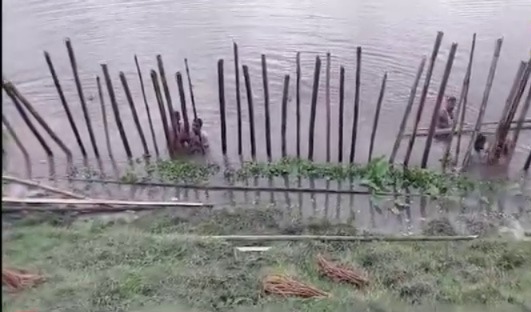 Flood waters threaten to wipe out Assam's Dokreshwar temple