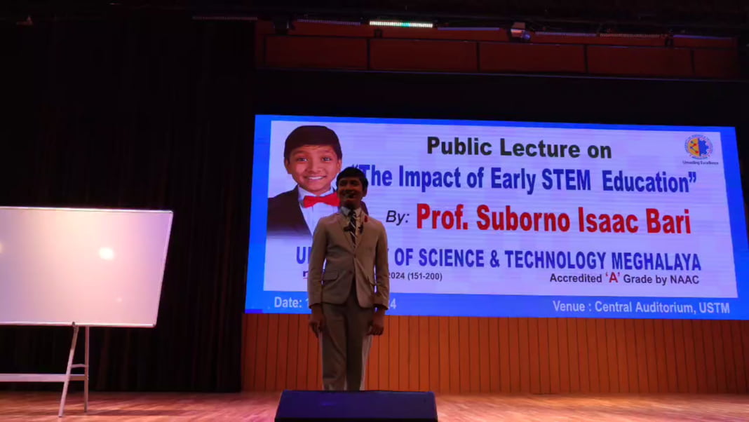 World's youngest professor, Suborno Isaac Bari, interacts with students at USTM