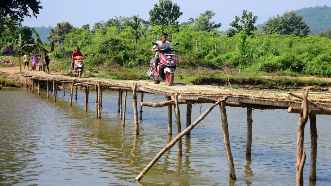 Left to their own devices: Kamrup villagers build bamboo bridge as government watchers look on