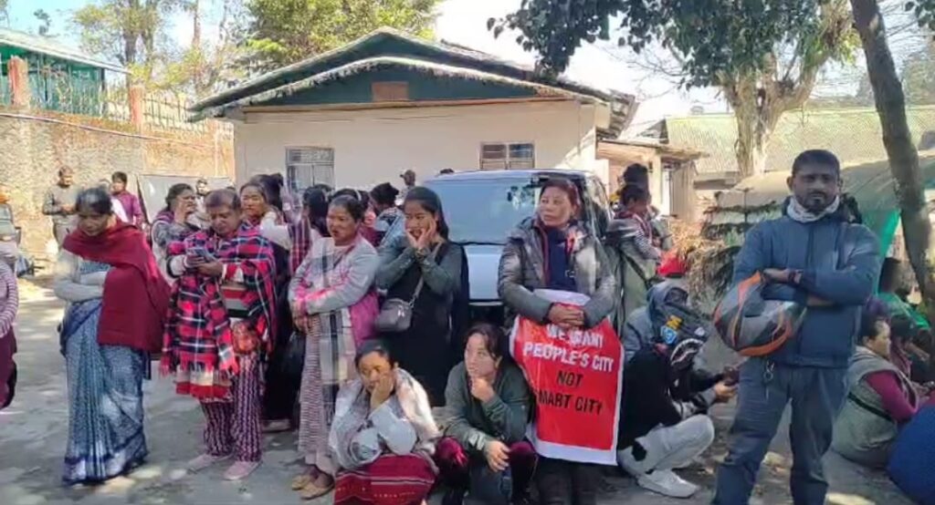 Vendors protest in front of SMB office against relocation plans from Khyndailad