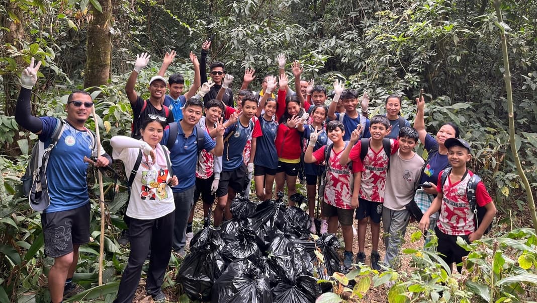 Promoting fitness & environment: Tura badminton players trek and clean Tura Peak